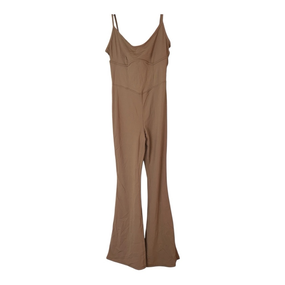 Tan jumpsuit. Target brand. Fresh material. The size is small.